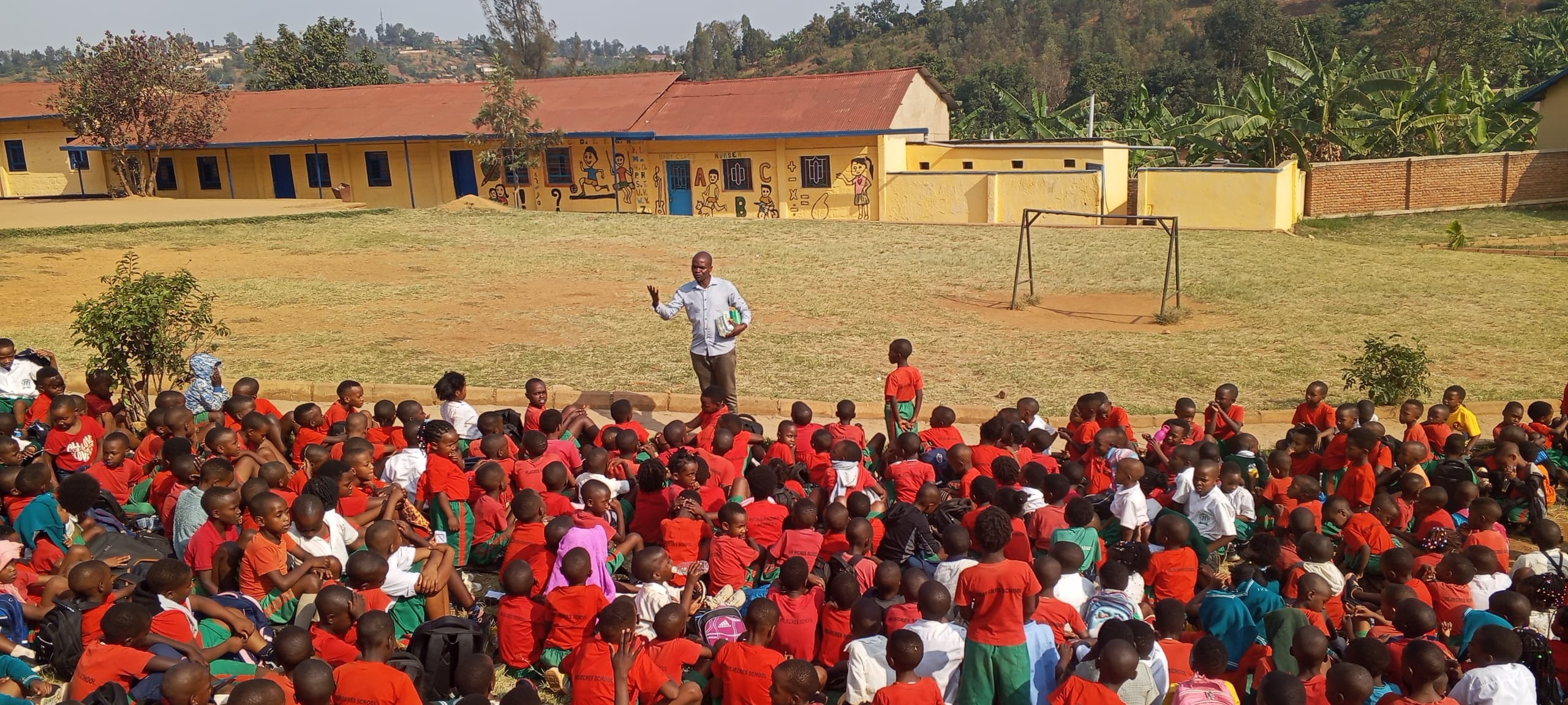 Teacher instructing students outdoors